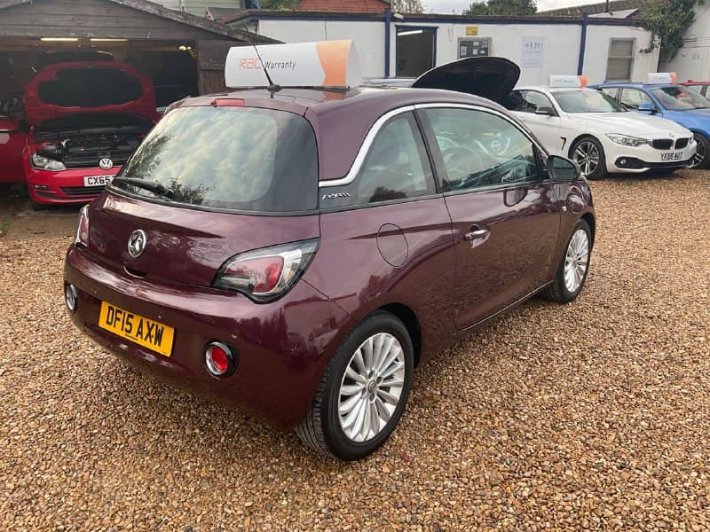 Before editing – original dealership vehicle photo.