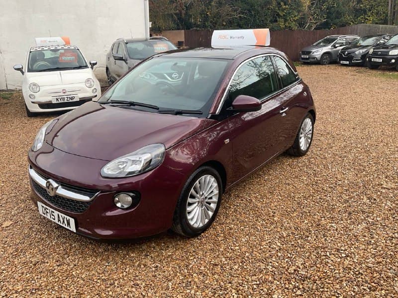 Before editing – outdoor vehicle shot on gravel forecourt.