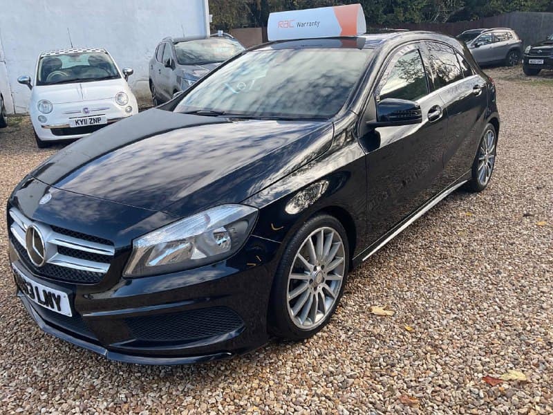 Before editing – vehicle image with outdoor background.